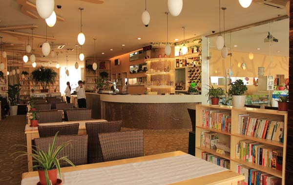 精裝修特色餐廳前臺裝修設(shè)計實景圖