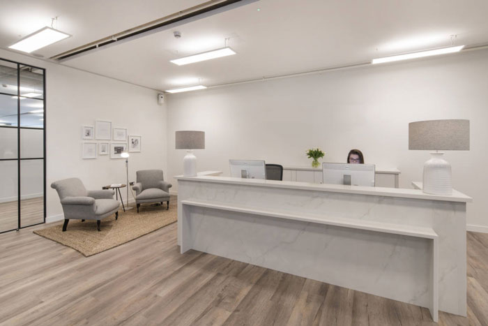 女裝公司辦公室前臺裝修設計效果圖